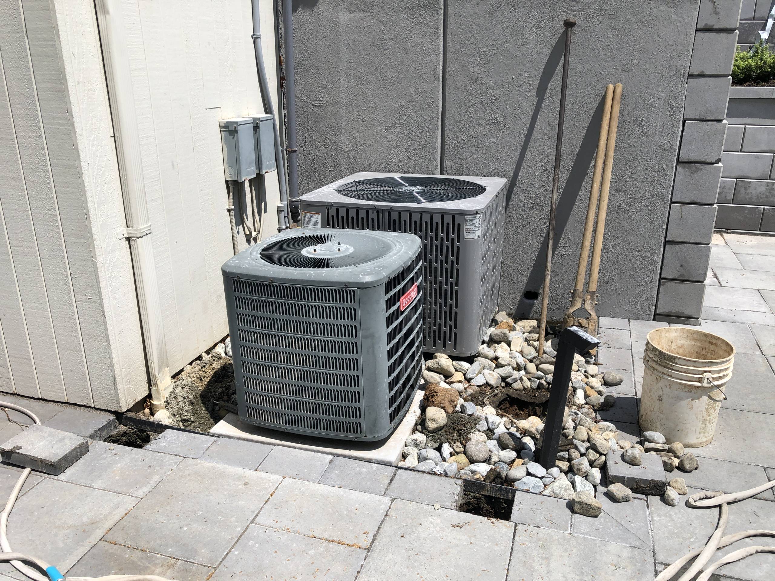 Exposed HVAC equipment alongside pool deck